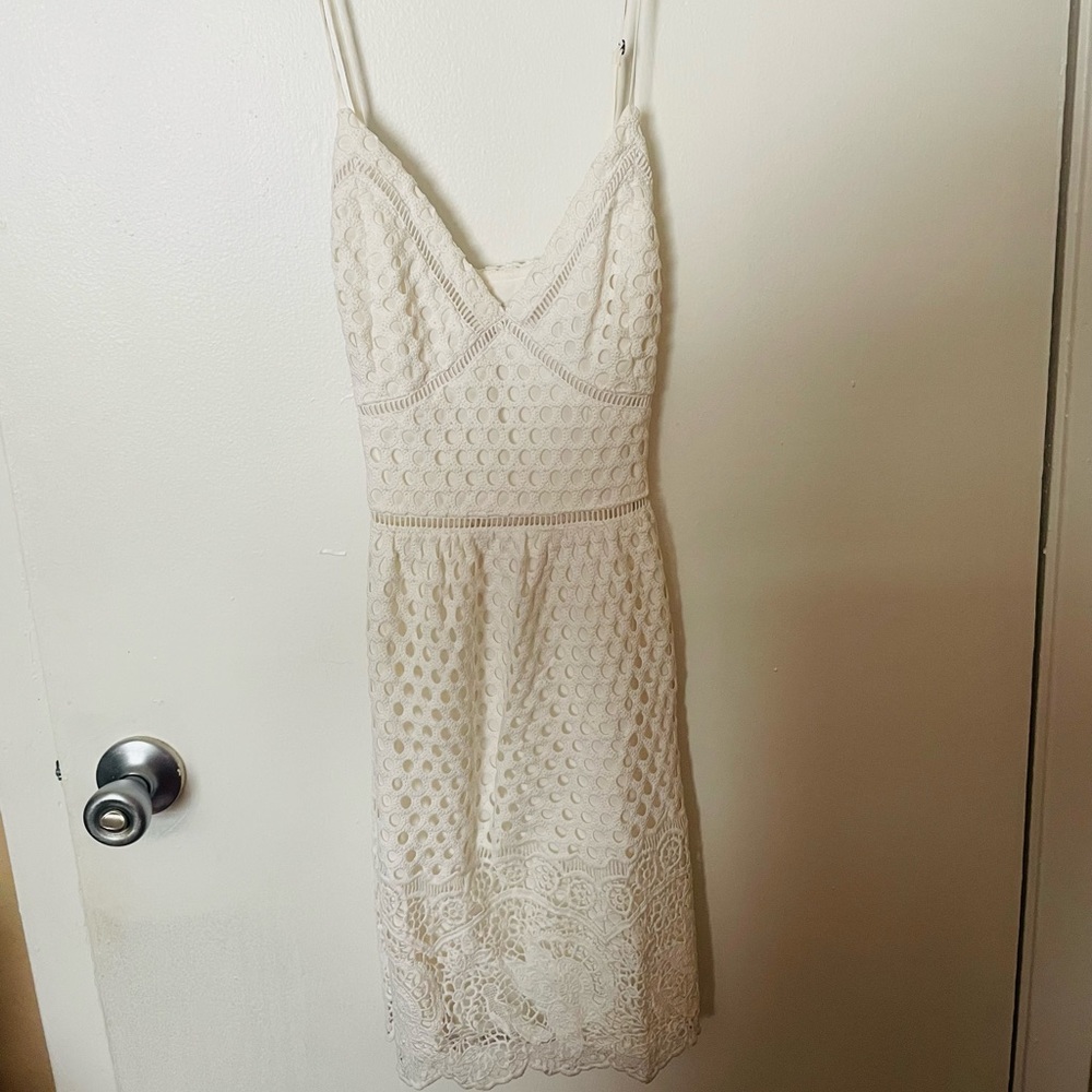 Lace White Dress. Super cute and brand new. Never been used.